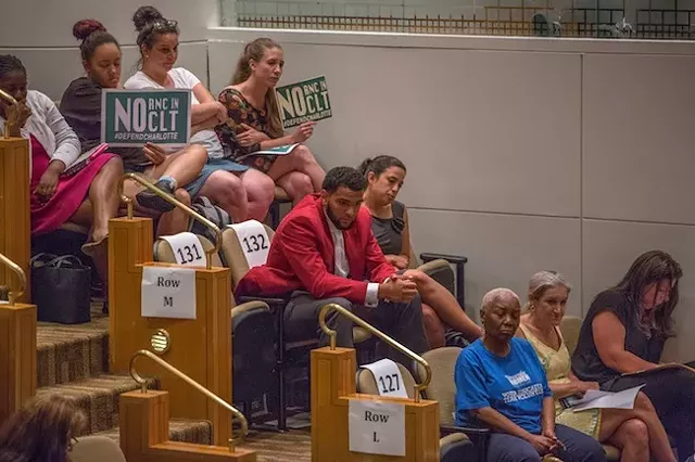 The last speakers look on at Monday's meeting. (Photo by Grant Baldwin)