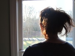 Emily, a victim of sexual assault and the subject of an episode of 'She Says,' in her home in 2017. (Photo by Ryan Pitkin)