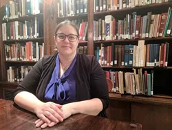 Focht in the library on the second floor of the museum.
