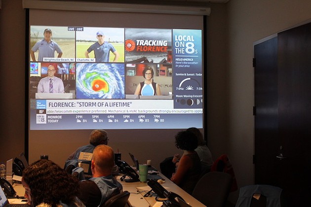 Experts in the Emergency Operations Center in Charlotte look on as Florence bears down on Charlotte. (Photo by Courtney Mihocik)