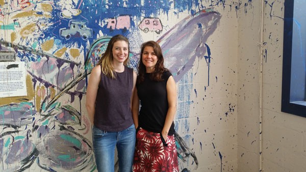 Amy Herman (left) and Amy Bagwell are co-directors for the Skyline series project underway at the former Goodyear spot. (Photo by Anita Overcash)