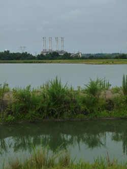 Duke's Riverbend plant and coal ash ponds in 2009. - PHOTO BY RHIANNON FIONN