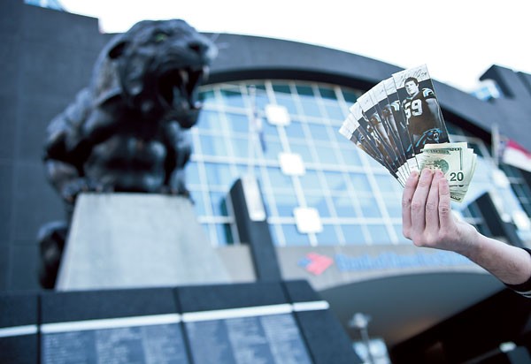 With the playoffs in town, ticket sales can be big business outside of Bank of America Stadium. (Photo by Jeff Hahne)