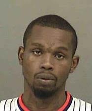 Devine Logan is wanted for robbery with a dangerous weapon. He was last known to be in the parking lot of New Hope Baptist Church on Hawthorne Lane, where his electronic monitor was found.