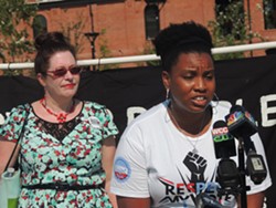 Nakisa Glover with the Hip Hop Caucus expressed her support for the "People, Not Polluters" platform. - RYAN PITKIN