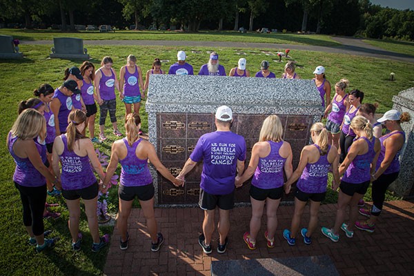 The ISF Dream Team kicked off their most recent season in July 2016 with a visit to Isabella’s gravesite, “to remind everyone of our purpose for running.” - CARRIE WATTS