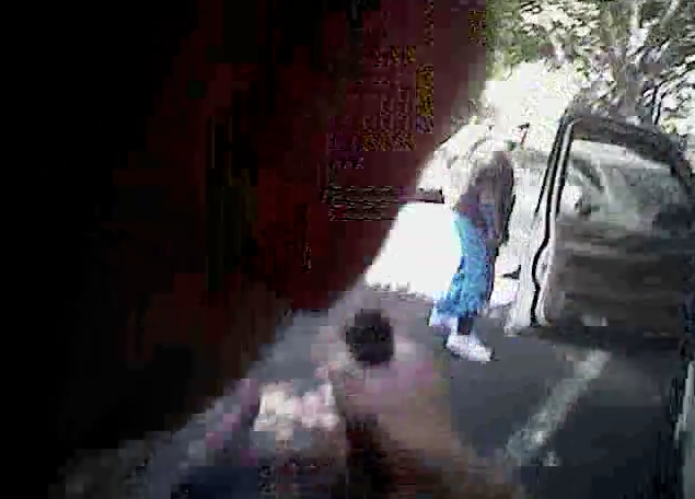 Still from the body cam footage of a uniformed officer on the scene when Keith Lamont Scott was shot
