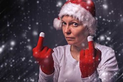 beautiful-woman-in-santa-claus-costume-giving-middle-finger-.jpg