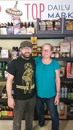 Kelly Call with her Tip Top Daily Market co-owner Scott McCannell shortly after they opened the business in 2015. - ANITA OVERCASH