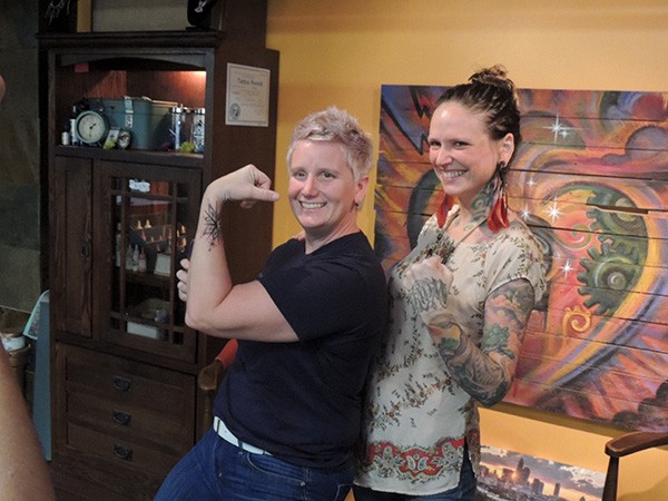 Jodi Winterton (left) shows off her Time Capsule Tattoo with Moran. - MELISSA MCHUGH