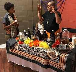 Danielle Hilton and L.A. McRae (right) talk at a recent tasting in Charlotte.