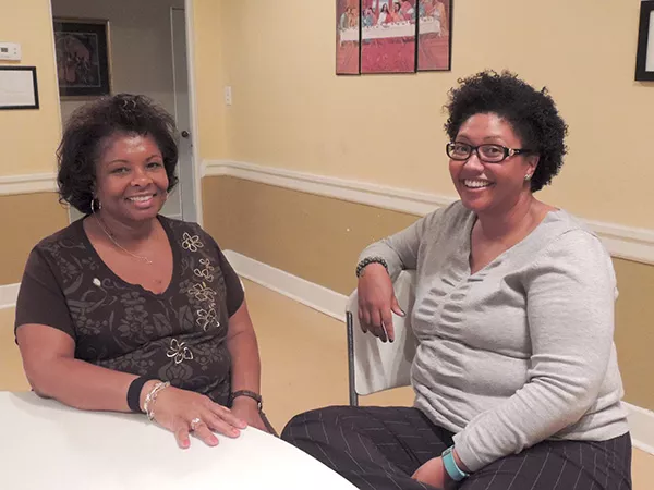 Linda Hill [left] and Jasmine Hines hang out after class. (Photo by Ryan Pitkin)
