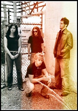 Sugar Glider in 2005: Emily Aoyagi, Chris Rigo, Cory Lambert (standing) and Howie (stooping).