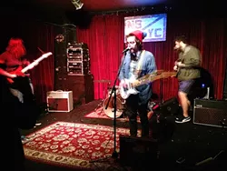 Brett Green and the Mineral Girls on stage in Cincinatti. (Photo by Josh Dawson)