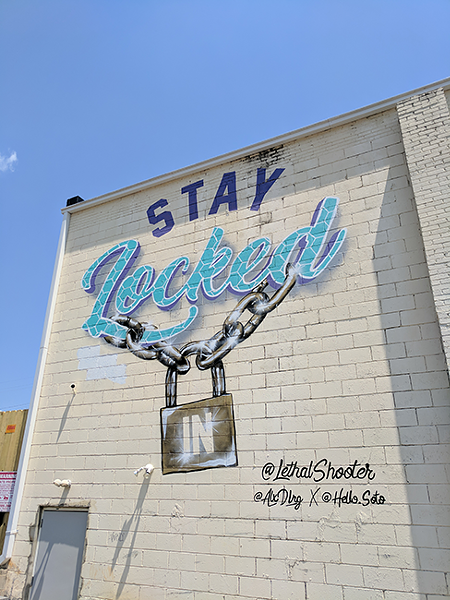 Alex DeLarge was involved with this mural outside of Abari and the former Joe’s Doughs location. (Photo by Ryan Pitkin)