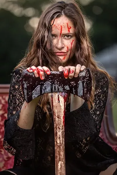 Katy Shepherd as Lizzie Borden.