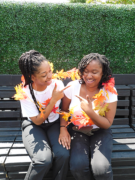 Millner and Windham have fun during the cover shoot. (Photo by Dana Vindigni)