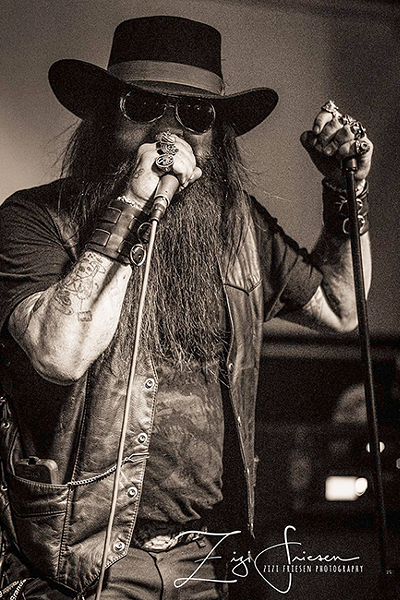 Moss belts it out. (Photo Courtesy of Johnny Moss)