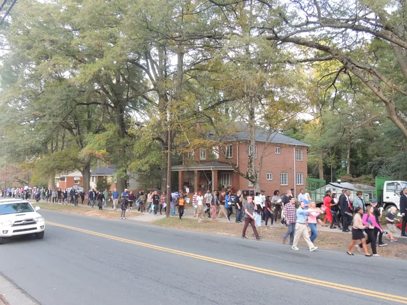 The "March to the Polls" on Parkway Avenue in west Charlotte. - RYAN PITKIN