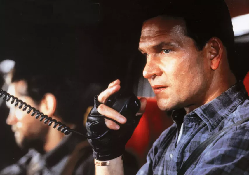 Patrick Swayze in Black Dog (Universal)