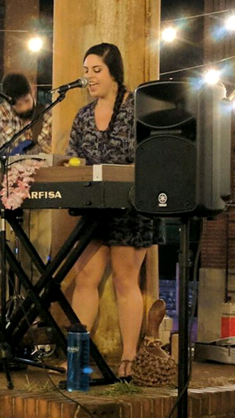Liza Ortiz belts it out.