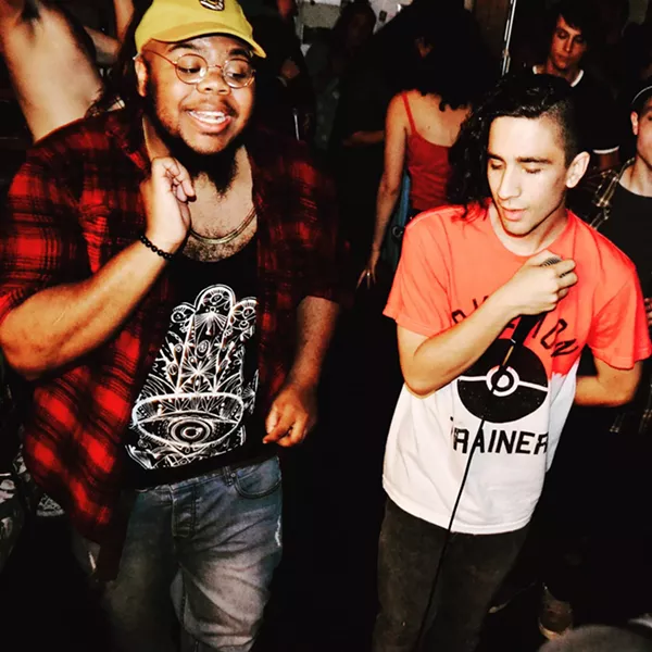Phaze Gawd and AMWA rock a house show. (Kaela Coopwood)