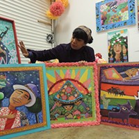 Rosalia Torres-Weiner in her studio with some of the “Magic Kite” panels. (Photo by Ryan Pitkin)