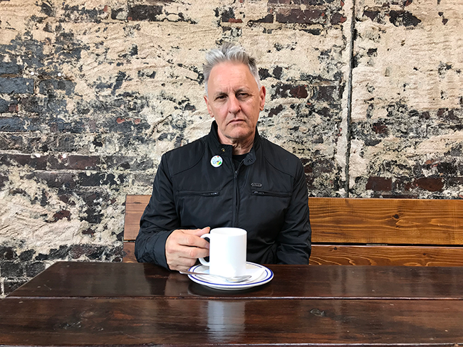 Mickey Stephens, immigrant, has coffee at a local Irish pub. (Photo by Mark Kemp)