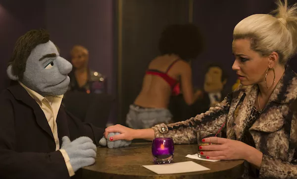 Phil Philips and Elizabeth Banks in The Happytime Murders (Photo: STX)