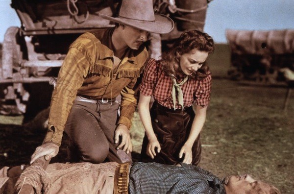 Errol Flynn and Olivia de Havilland in Dodge City (Photo: Warner Bros.)