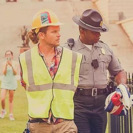 James Tyson was arrested alongside Newsome after the two worked together to take down the flag. (Photo by Adam Anderson)