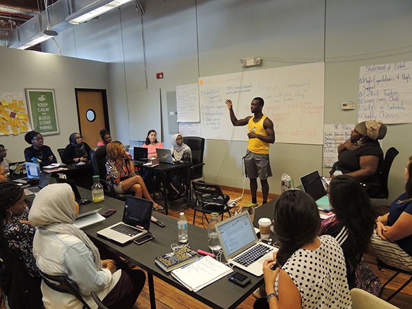 Bokar Diaby addresses fellow students partipating in a fellowship with the Students for Education Reform Action Network this summer. (Photo by Ryan Pitkin)