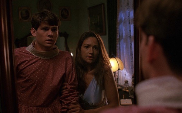 Henry Thomas and Olivia Hussey in Psycho IV: The Beginning (Photo: Shout! Factory)