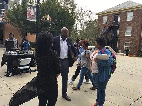 Reggie Love speaks with students at Johnson C. Smith University. - ROBYN PATTERSON