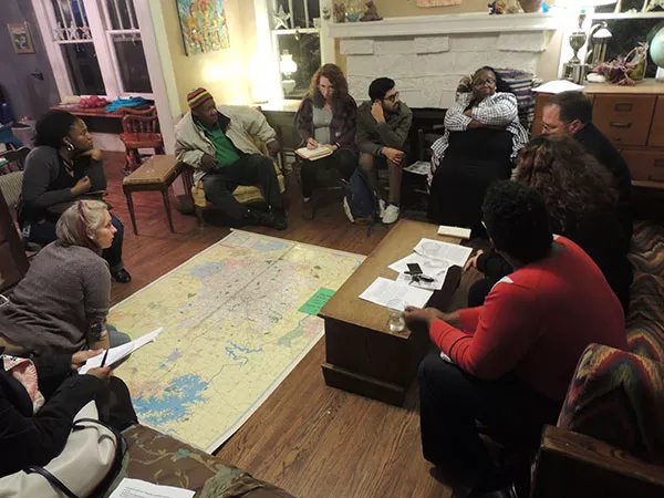 Organizers with the West Side Land Trust (working title) discuss which neighborhoods should be included in the trust at a recent meeting. - RYAN PITKIN
