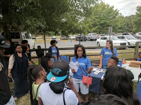 Salvador speaks to residents at a recent RETI Energy Hero event in on Clanton Road.