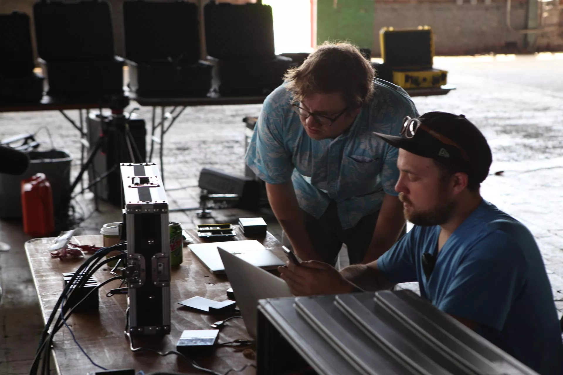 Button and Tyndall (seated) check out the footage from Down Yonder at Camp North End. (Photo by Alex Cason)