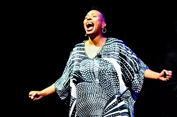 Kenya Templeton belts out a house version of "My Favorite Things" during the 2016 "A Soulful Noel." (Gena J. Photography)