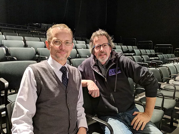 John Sisko (left), the dean of Queens University’s College of Arts & Sciences, with ATC executive director Chip Decker. (Photo by Carrie Cranford)