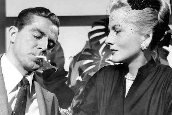 Dana Andrews and Joan Fontaine in Beyond a Reasonable Doubt (Photo: Warner)