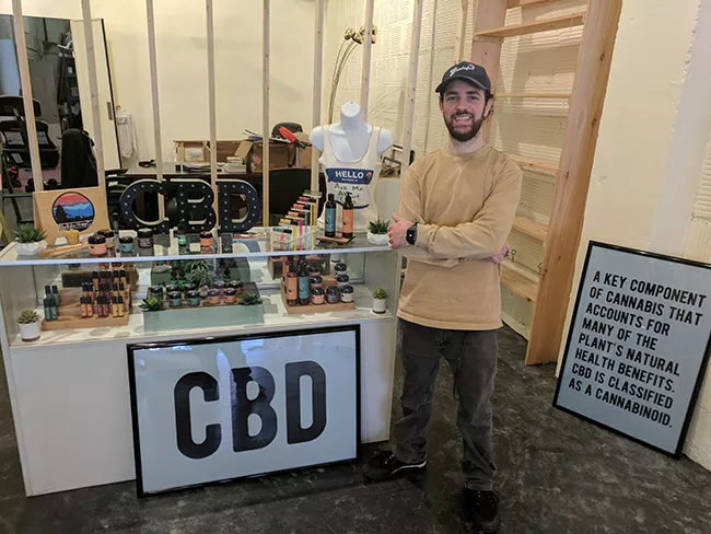 Will Oseroff of Blue Ridge Hemp Company is building out a bigger storefront in his space, connected to a t-shirt shop in Asheville.