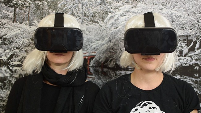 Camerin Watson and Jessica Stewart wear VR headsets in Taproot CLT's 'What Future is It Now?' (All photos courtesy of Taproot)