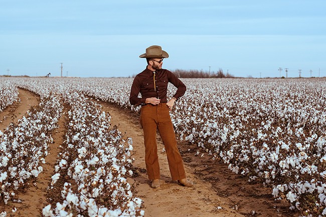 Mr. Crockett surveys the cotton.