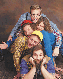 With his band mates, Deer Tick’s John McCauley is the man in the yellow hat.