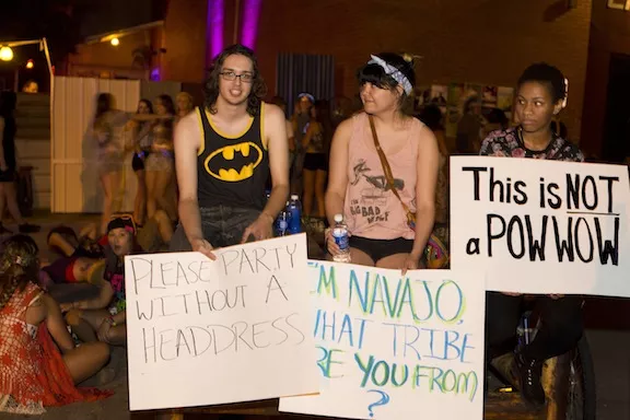 Wesley Stevens, Tawa Poplin-Redhouse and Kayla Holland protest the Pow Wow on May 23, 2014.