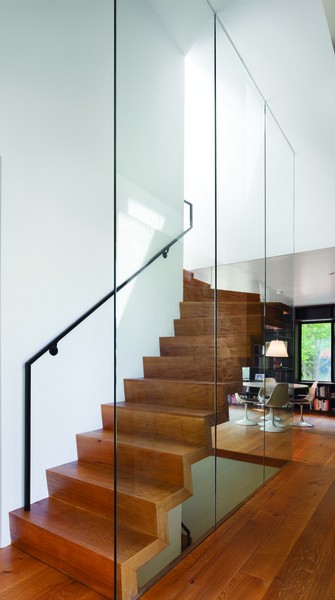 A glass-surrounded, cantilevered stair. - PAUL WARCHOL