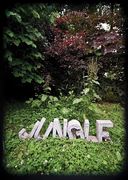 A sculpture by Kinney in his garden.