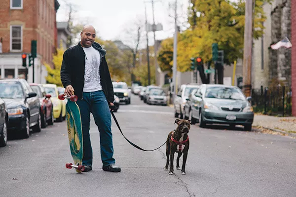 Brett Morton and his dog Spider in Hudson. - THOMAS SMITH