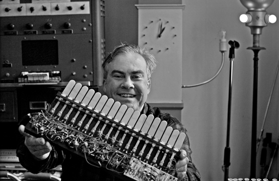 Brian Dewan holds the inner workings of a vintage organ. - FIONN REILLY