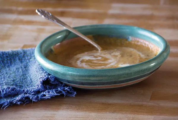 Carrot soup with crème fraîche. - PETER BARRETT